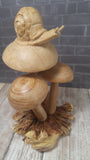 Small wooden handcarved snail on mushroom from Indonesia GGandJ.com