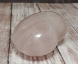 Side View of rose quartz gemstone heart for sale
