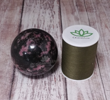 Rhodonite Sphere with thread spool size reference