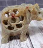 Baby inside of mother elephant carved gemstone on GGandJ.com Natural Baby Shower gift idea