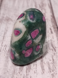 Tumbled red green and white ruby fuchsite nugget