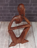 Partial person wood figure abstract carving