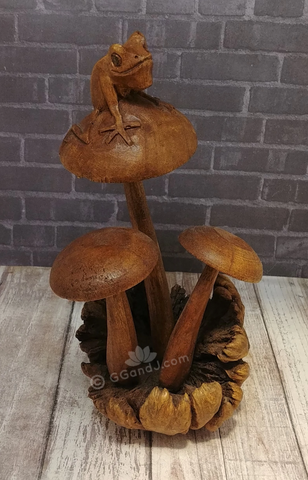 Hand carved Indonesian wood frog on mushroom art on GGandJ.com Gypsy Gems & Jewelry Naturally Unique