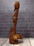 Hand carved seahorse figure on Gypsy Gems & Jewelry GGandJ.com wood lizard wooden reptile  with thread spool size reference