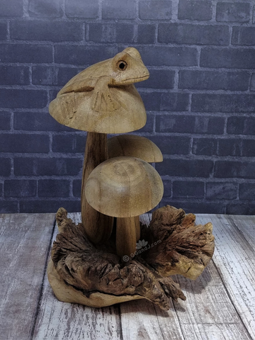 Hand carved frog on mushroom figure on Gypsy Gems & Jewelry GGandJ.com wood lizard wooden reptile  with thread spool size reference