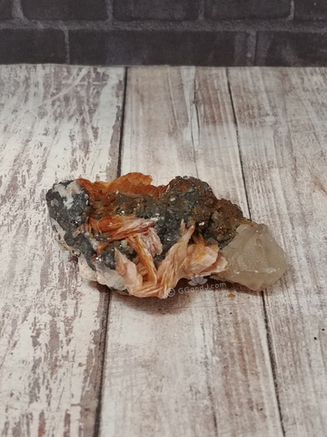 Calcite and Baryte on Galena with wood grain background