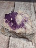 Purple cube shaped stone