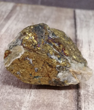 Close up of rough copper on mineral matrix