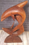 handcarved wood dolphin statue from indonesia on Gypsy Gems & Jewelry Interior decor natural wood statue