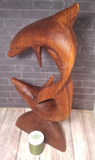 handcarved wood dolphin statue from indonesia on Gypsy Gems & Jewelry Interior decor natural wood statue with thread spool size reference
