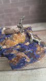 Pewter mermaid and seal figurines on rough azurite gemstone